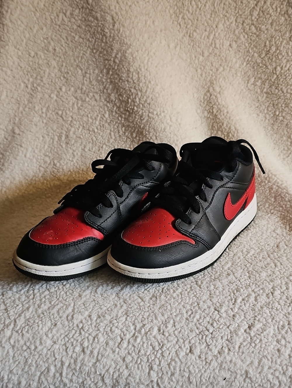 Jordan Youth Black And Red Sneaker with Jumpman Label